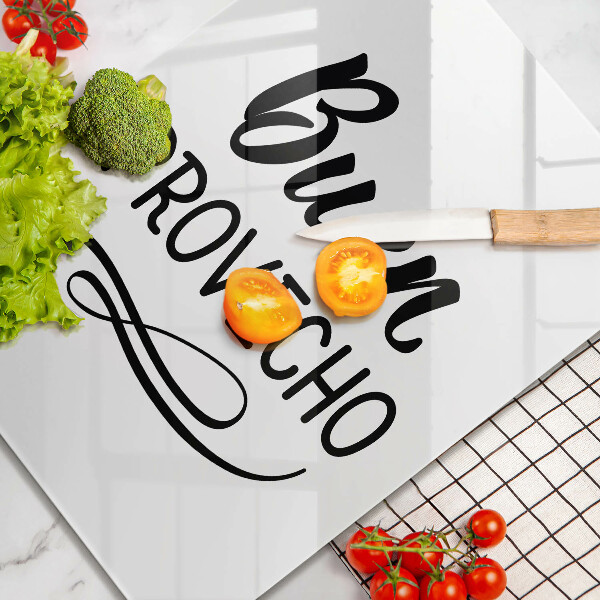 Skärbräda i glas Inskriptionen Buen provecho