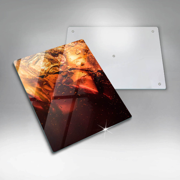 Skärbräda i glas Cola drink med is