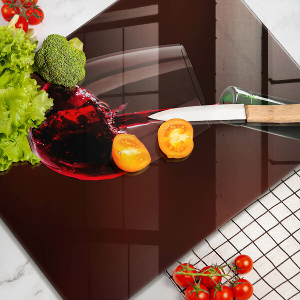 Skärbräda i glas Ett glas vin