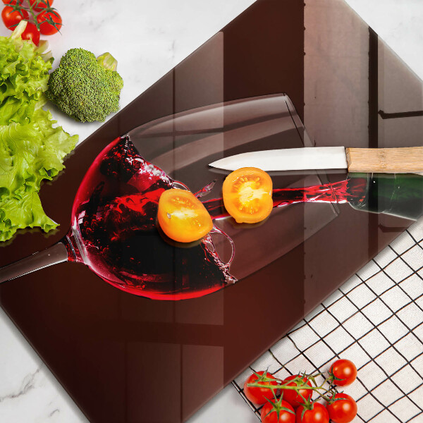 Skärbräda i glas Ett glas vin