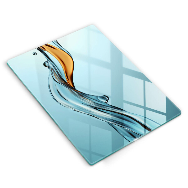 Skärbräda i glas Vattenstråle