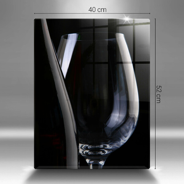 Skärbräda i glas Ett glas och en flaska