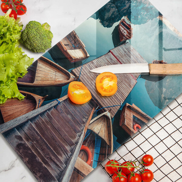 Skärbräda i glas Båtar på sjön