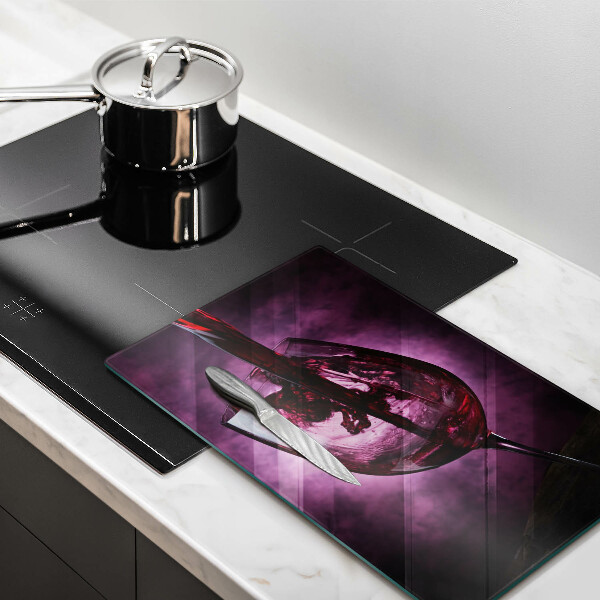 Skärbräda i glas Ett glas vin