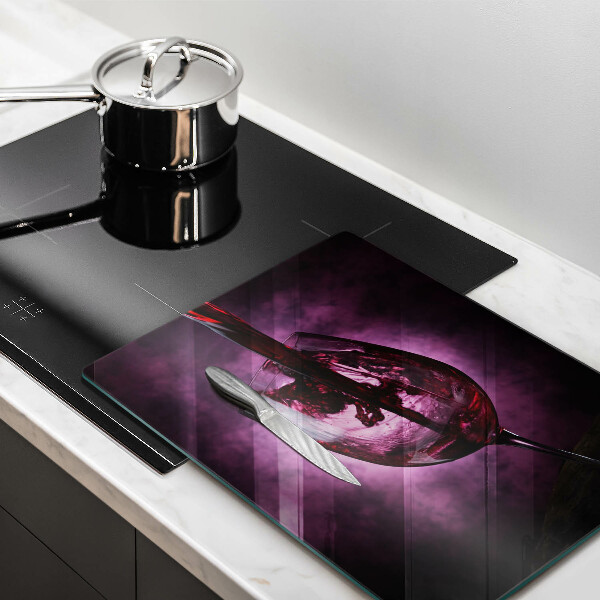 Skärbräda i glas Ett glas vin