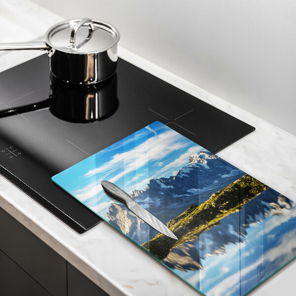 Skärbräda i glas Bergslandskap