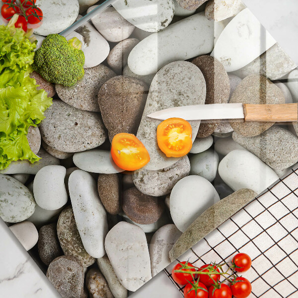 Skärbräda glas Små stenar bakgrund