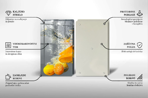 Skärbräda glas Citroner i vatten