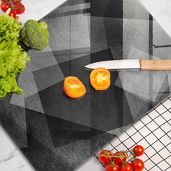 Glasskärbräda med geometrisk abstraktion