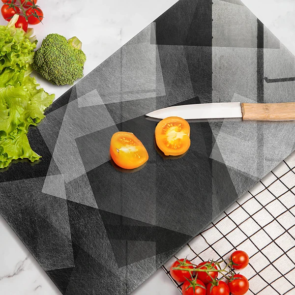 Glasskärbräda med geometrisk abstraktion