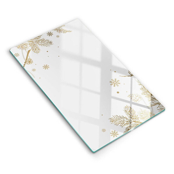 Glasskärbräda med vinterdekorationer