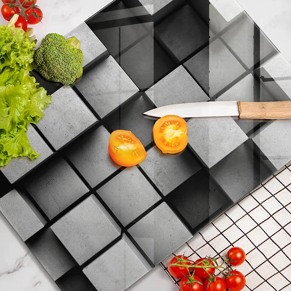 Glasskärbräda med 3D-geometrisk bakgrund