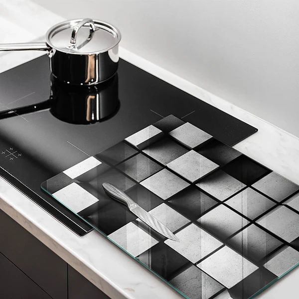 Glasskärbräda med 3D-geometrisk bakgrund