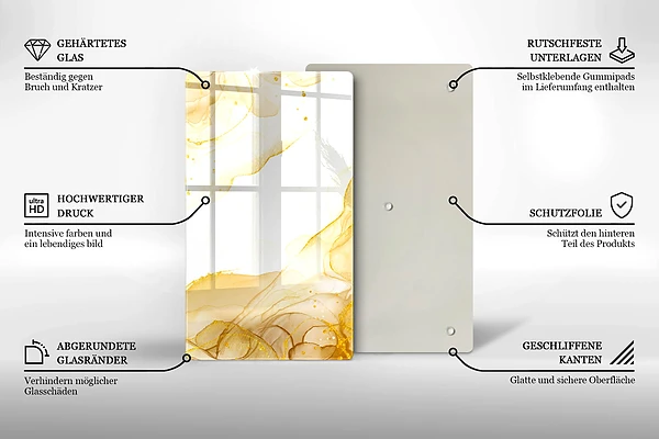 Glasskärbräda med gyllene abstraktion