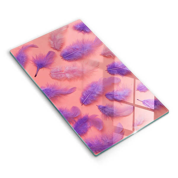 Glasskärbräda med motiv av fluffiga fjädrar