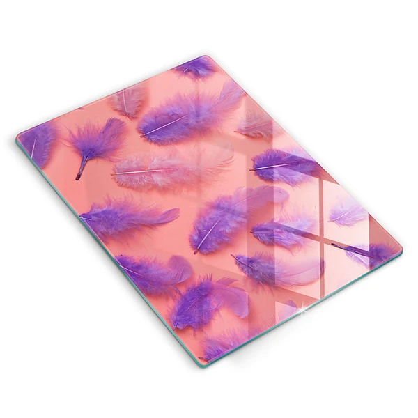 Glasskärbräda med motiv av fluffiga fjädrar