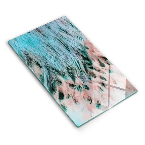 Glasskärbräda med motiv av boho-fågelfjädrar