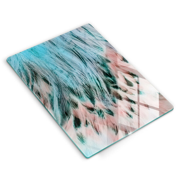 Glasskärbräda med motiv av boho-fågelfjädrar