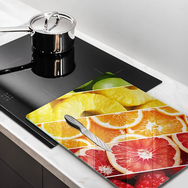 Glasskärbräda med motiv av färgglada frukter