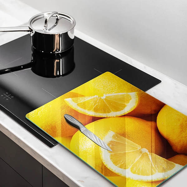Glasskärbräda med motiv av saftiga citroner