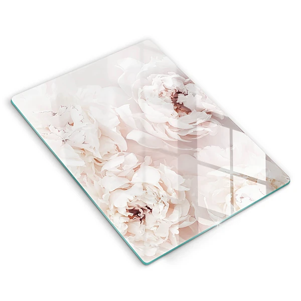 Glasskärbräda med motiv av pastellfärgade pioner