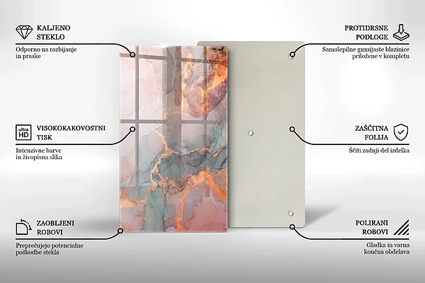 Glasskärbräda i marmorimitation med gulddetaljer