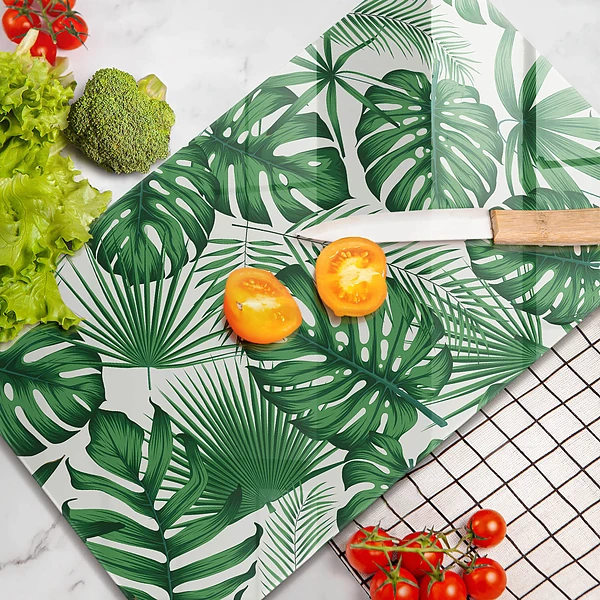 Glasskärbräda med Monstera-motiv