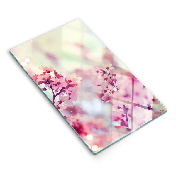 Glasskärbräda med motiv av vårrosa blommor