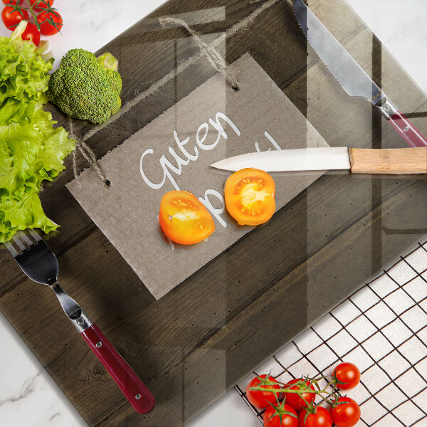 Skärbräda i härdat glas På brädorna står det Guten Apetit