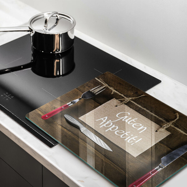 Skärbräda i härdat glas På brädorna står det Guten Apetit