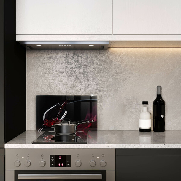 Skärbräda i härdat glas Ett glas rött vin