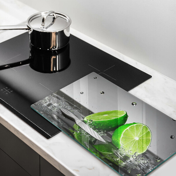 Skärbräda i härdat glas Saftiga lime och vatten