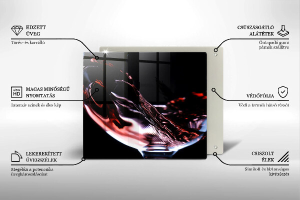 Skärbräda av glas Ett glas rött vin