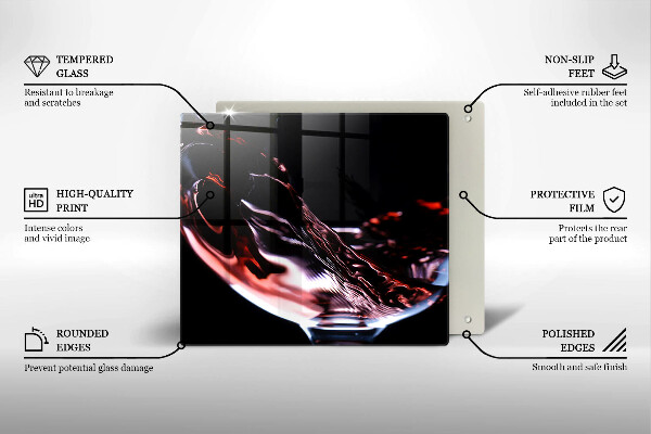 Skärbräda av glas Ett glas rött vin