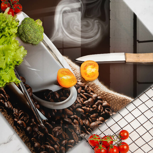 Skärbräda av glas Kaffe och en kopp