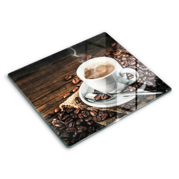 Skärbräda av glas Kopp och kaffebönor