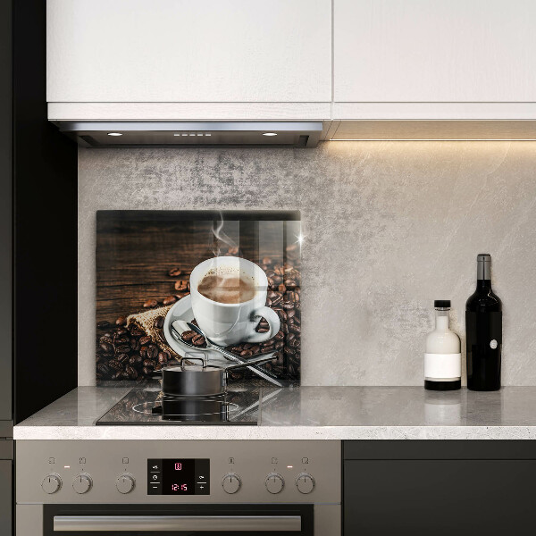 Skärbräda av glas Kopp och kaffebönor