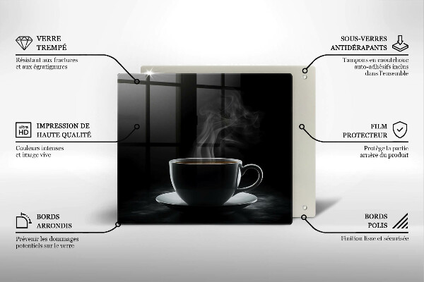 Skärbräda av glas En varm kopp kaffe