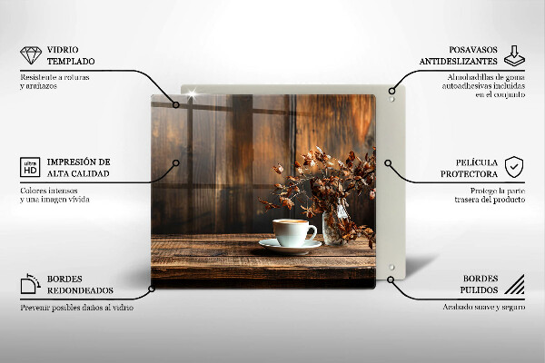 Skärbräda av glas En kopp kaffe och ved