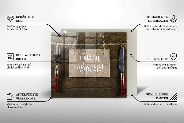 Skärbräda av glas På brädorna står det Guten Apetit