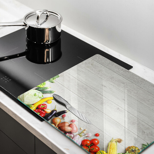 Skärbräda av glas Grönsaker på brädor