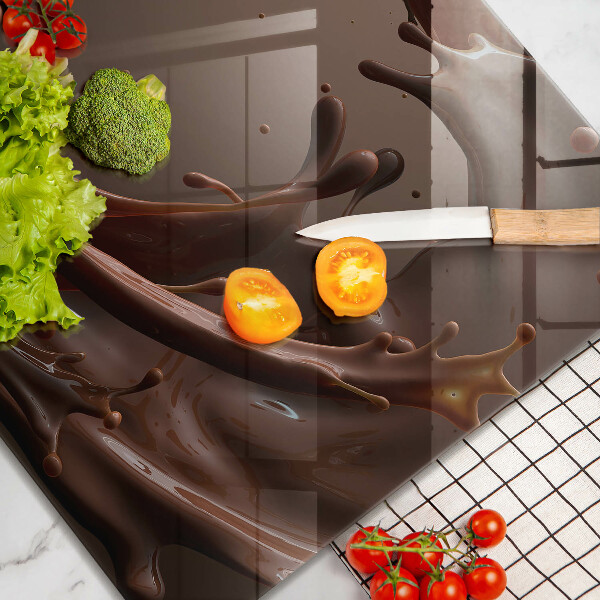 Skärbräda av glas Flytande choklad