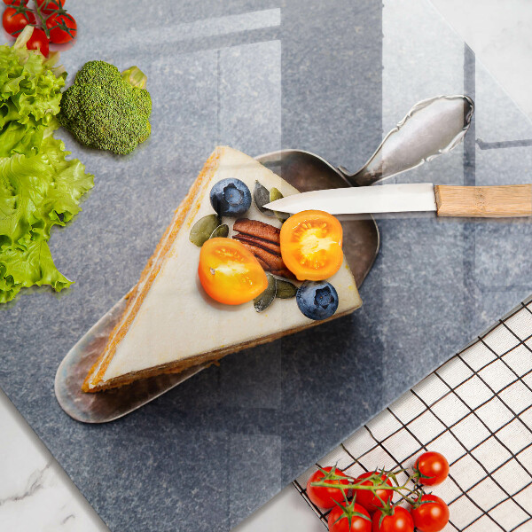 Skärbräda av glas En bit tårta