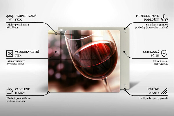 Skärbräda av glas Ett glas rött vin