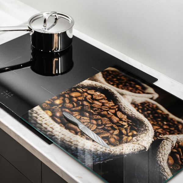 Skärbräda av glas Påsar med kaffebönor