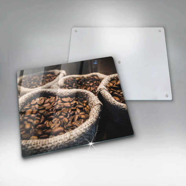 Skärbräda av glas Påsar med kaffebönor