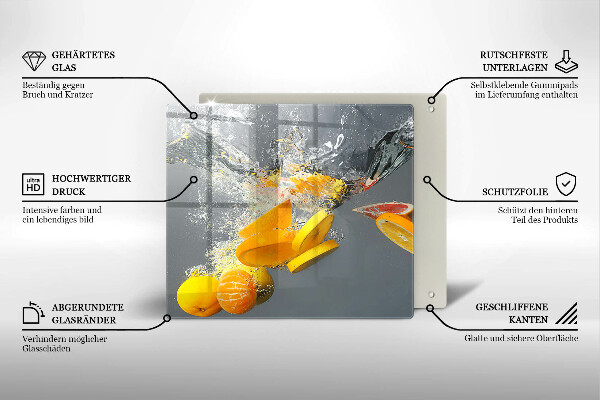 Skärbräda av glas Citroner i vatten