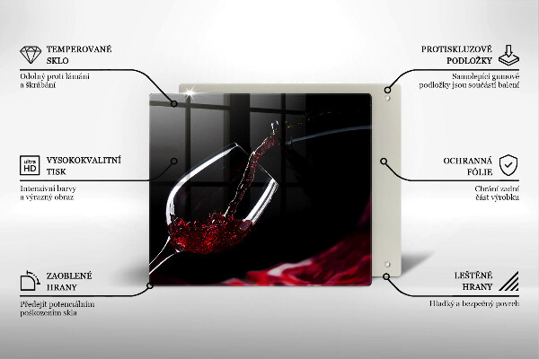 Skärbräda av glas Ett glas rött vin