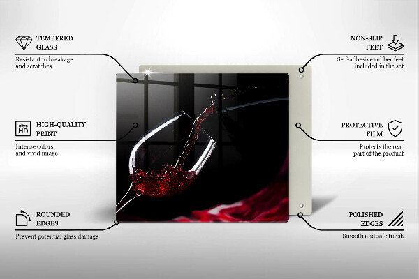 Skärbräda av glas Ett glas rött vin