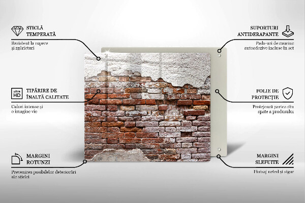 Skärbräda av glas Gammal tegel- och betongvägg
